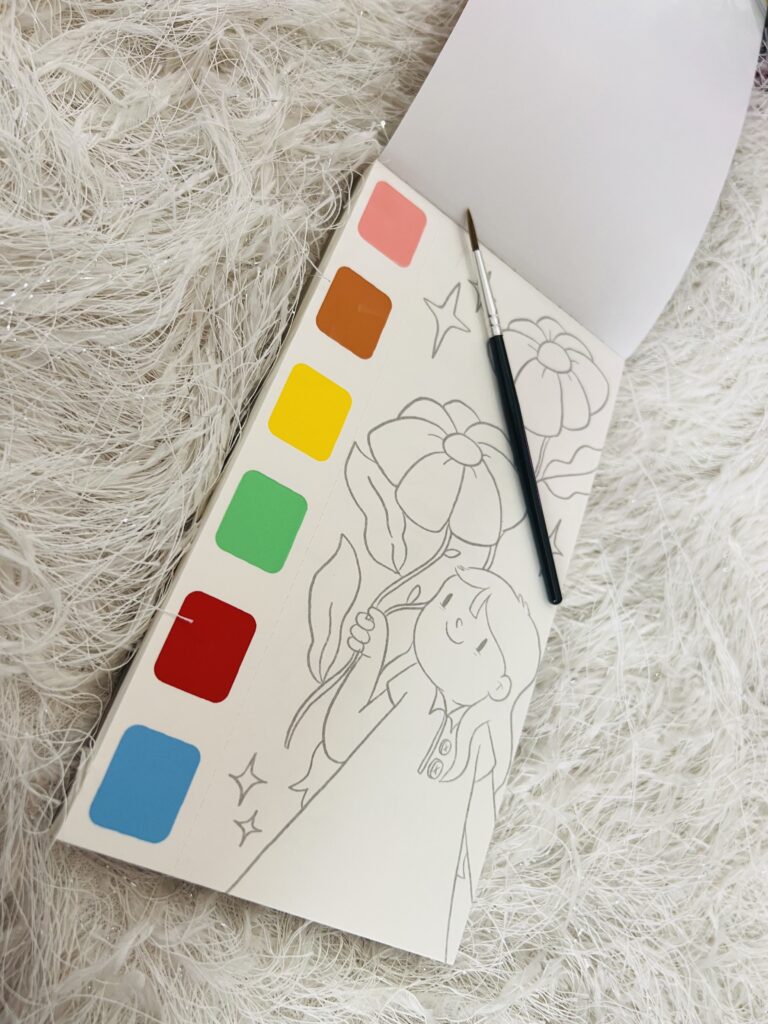 Lost in the World of Alicia Souza: A Planner Lover's Journey - Paint Book with brush view - TheMemoryBites