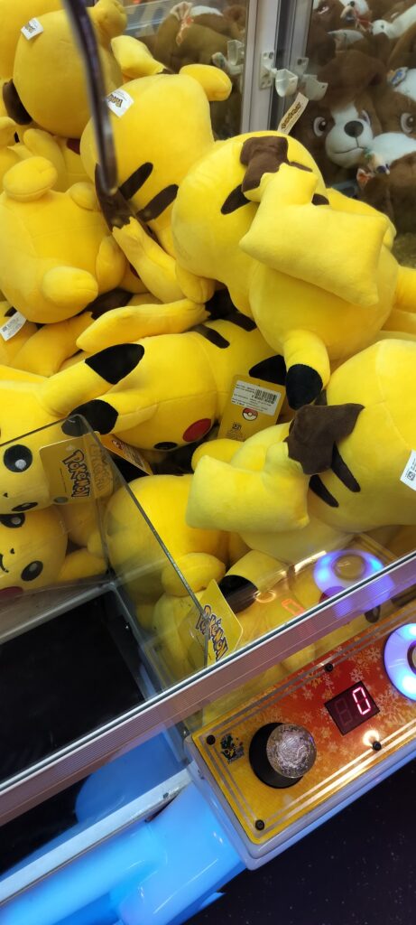 Hooked on Pikachu : A Claw Machine Adventure - Pikachu in Claw Machine - TheMemoryBites