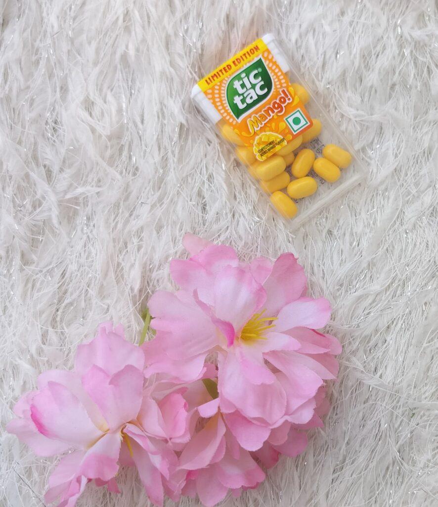 Tiny Mints, Big Flavours: My Colourful Adventure with Tic Tac - Mango Tic Tac - TheMemoryBites