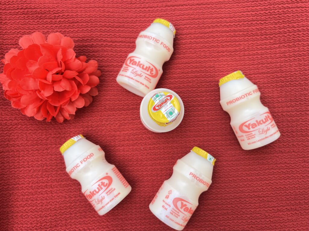 Tiny Bottle, Big Surprise: Exploring Yakult Mango Fusion - Yakult Mango Bottles - TheMemoryBites